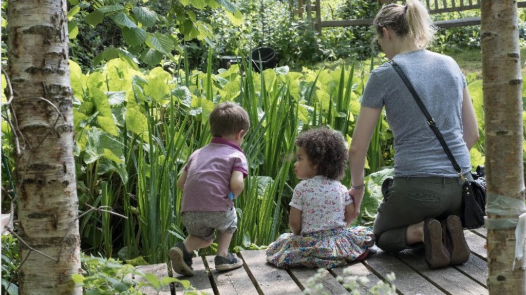 Families enjoying a moment of stillness at the pond, Mortimer Terrace Nature Reserve 2020